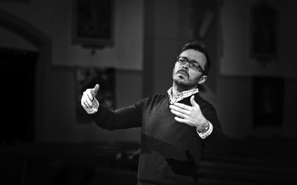 Christopher Hossfeld conducting.